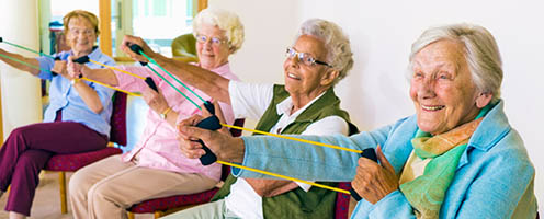 Elderly ladies exercising to promote good health
