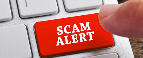 Keyboard with red key SCAM ALERT