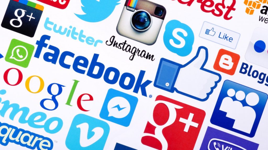 image of social media icons, highlighting Facebook in particular